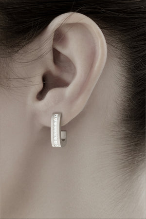 earrings 1 by stuart moore, platinum diamond 3/4 hoop worn on the ear