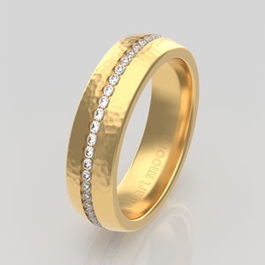 stuart moore round 5.5mm soft hammered channel round wedding band in 18k yellow gold / full eternity