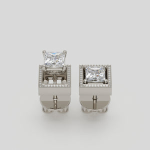 earrings 27 by stuart moore, four-prong platinum studs with 8 mm pavé jackets